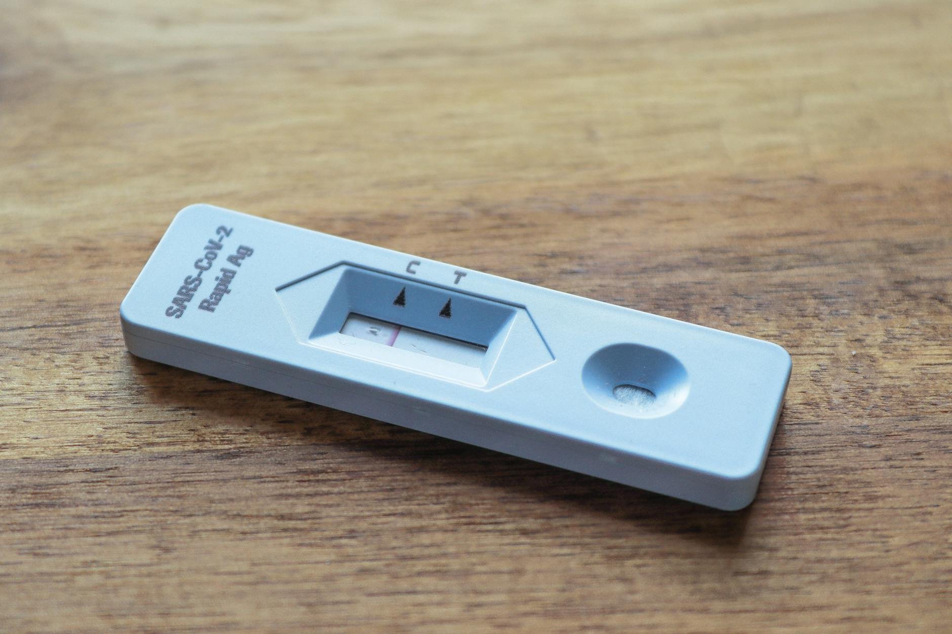 Healthcare professional holding a brochure about cancer prevention.