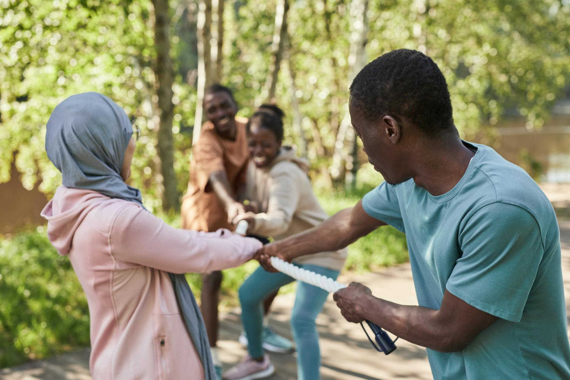 happy diverse group of friends enjoying a leisurely walk in nature - hidden causes low energy