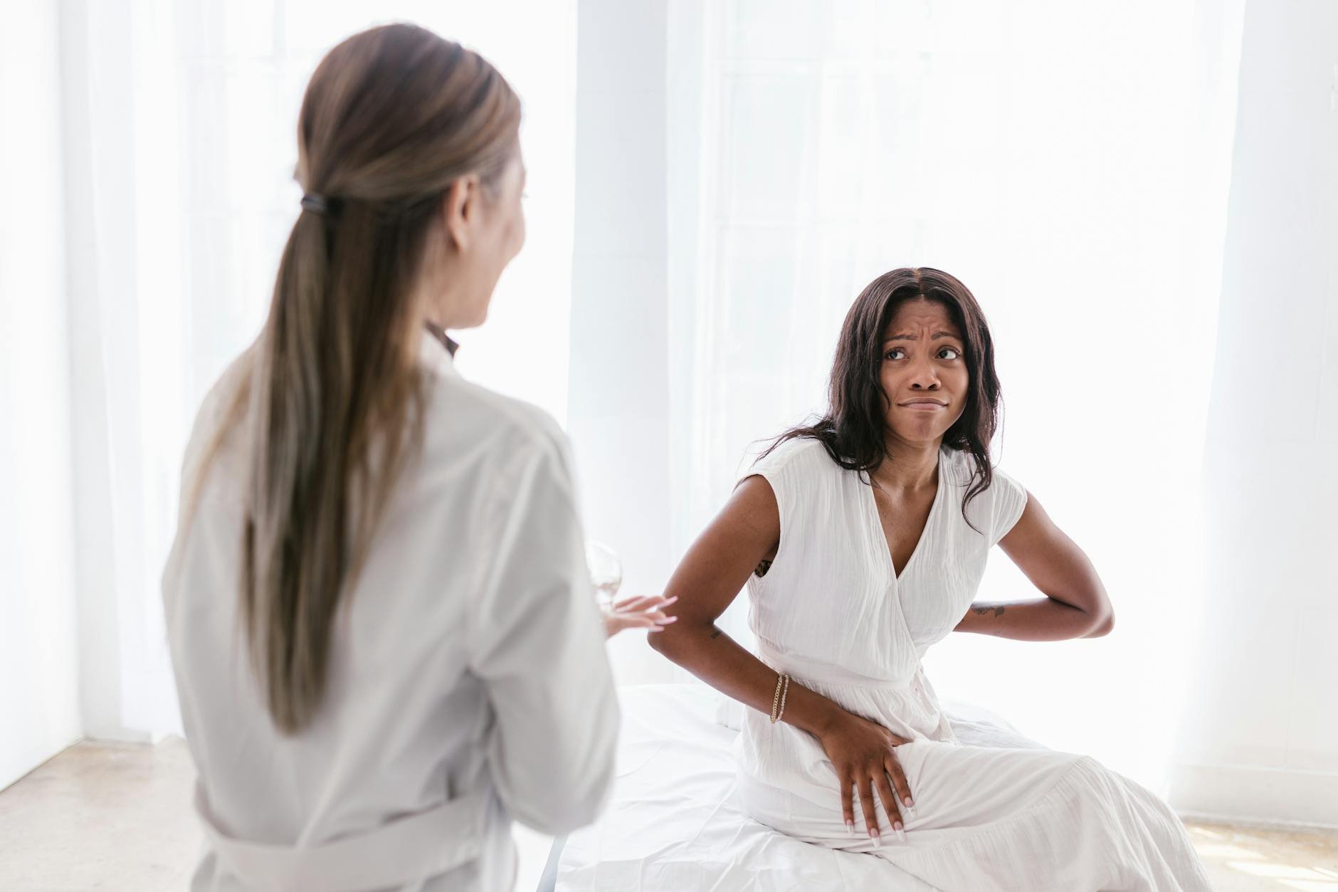 Doctor consulting with patient about sleep issues - Still Tired After Sleep