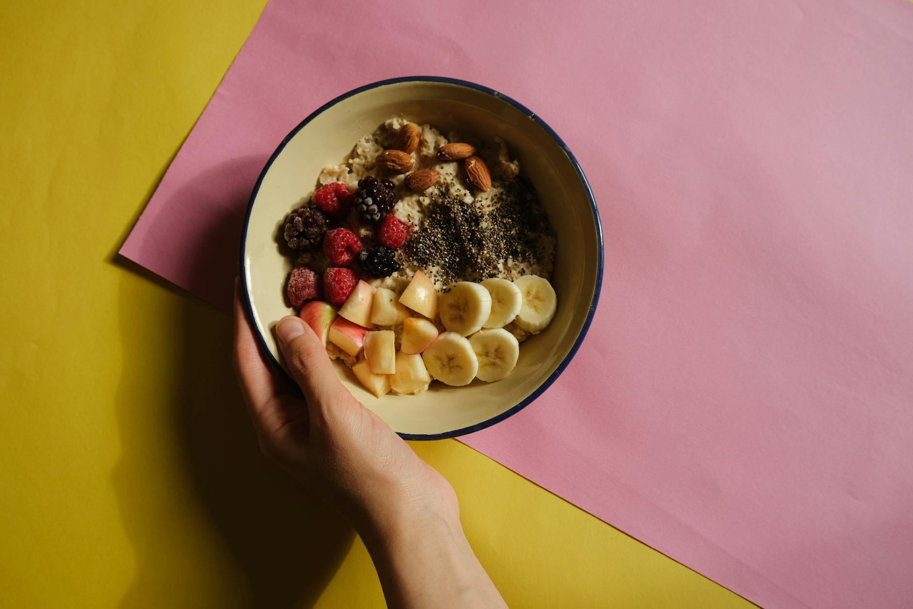 Healthy balanced breakfast bowl with fruits and nuts - Still Tired After Sleep