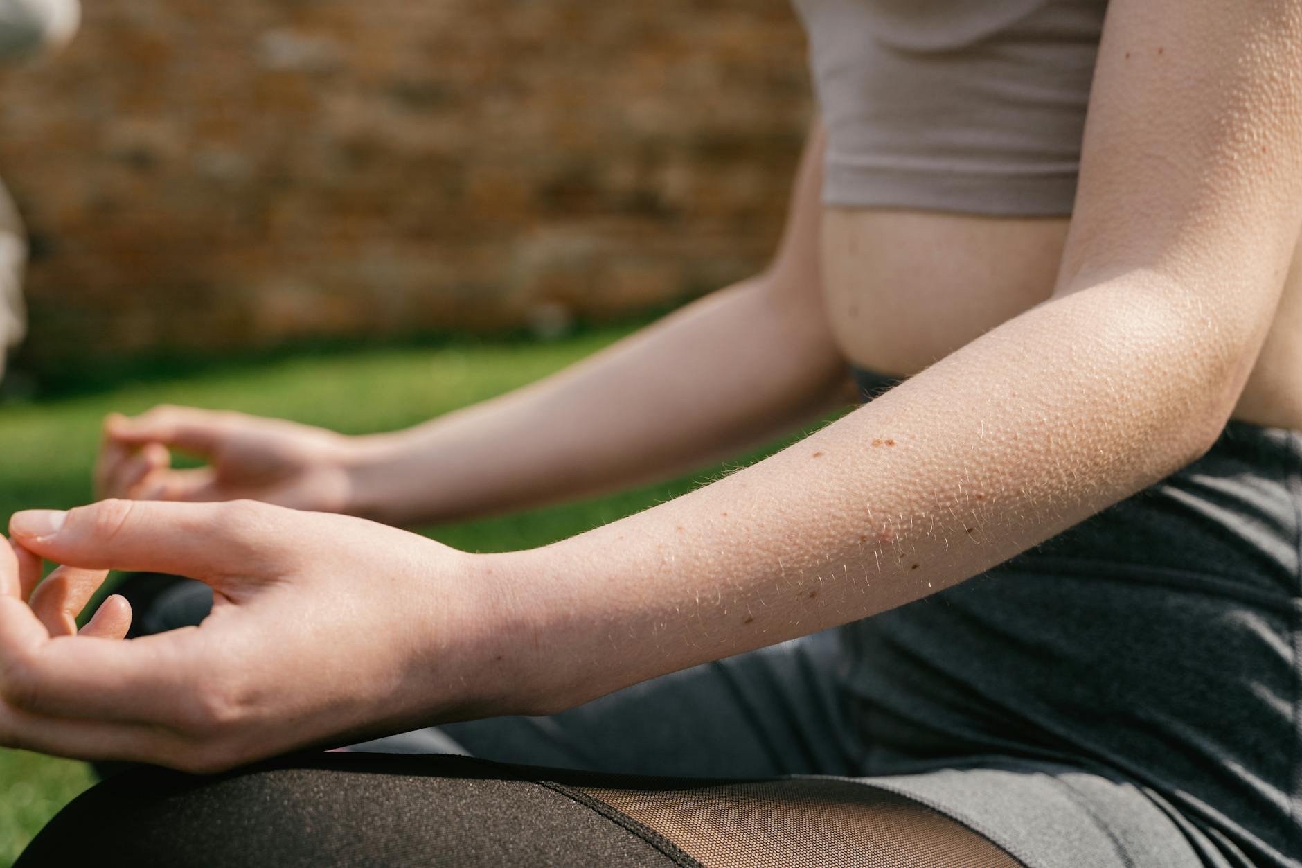 Person practicing gentle evening yoga or meditation - Still Tired After Sleep