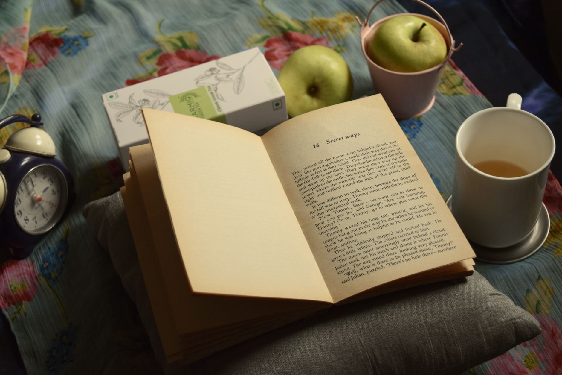 a relaxing evening routine with a book and herbal tea before bed - Magnesium for Sleep